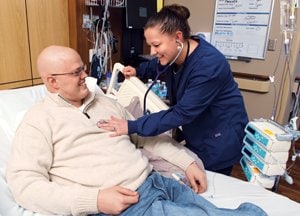 Amanda Engnell, RN, checks on Steve.